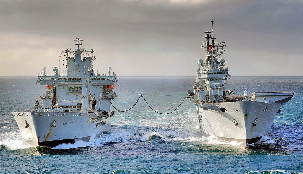 A ship at sea refueling