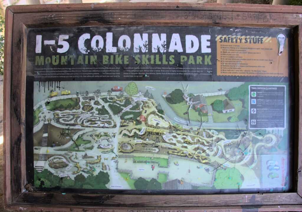 A graphical map of the I-5 Colonnade Mountain Bike Skills Park sign/map from the top of the park